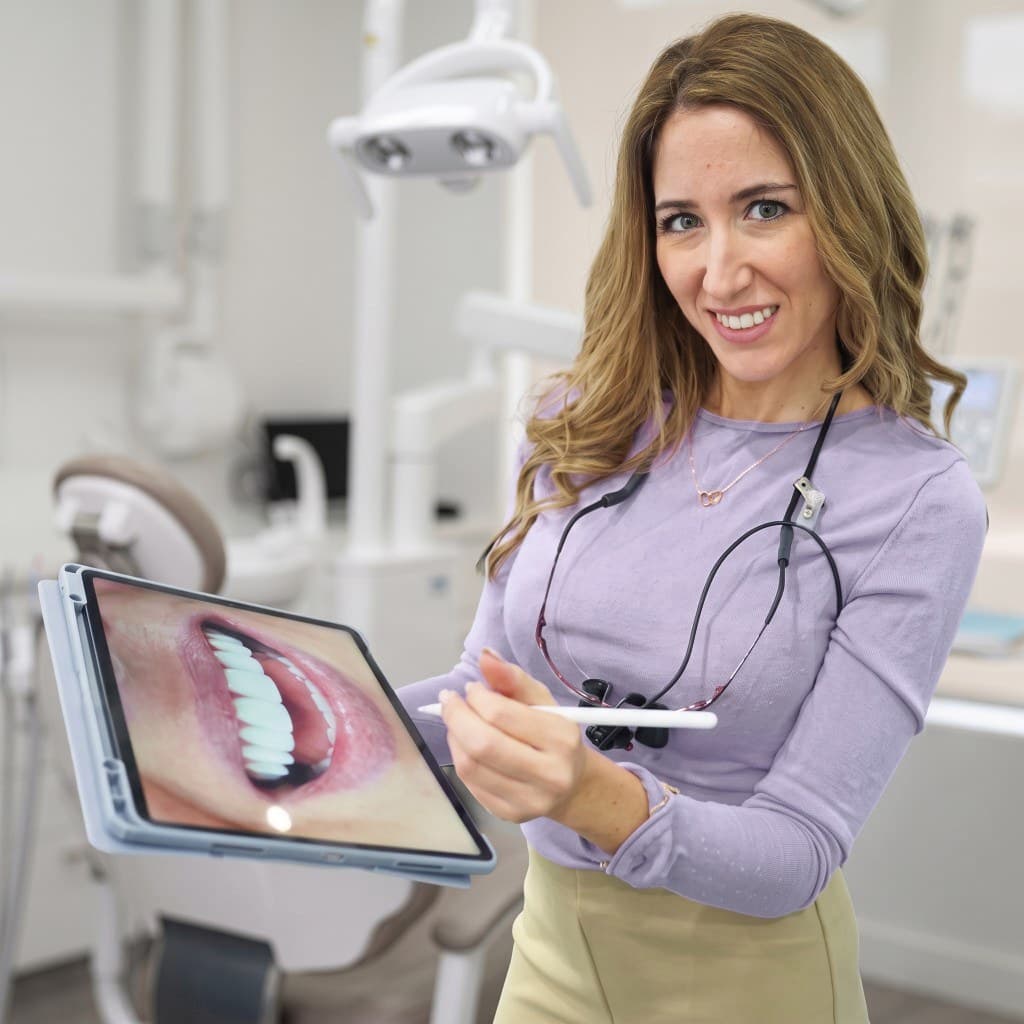 Dentist smiling in the treatment room